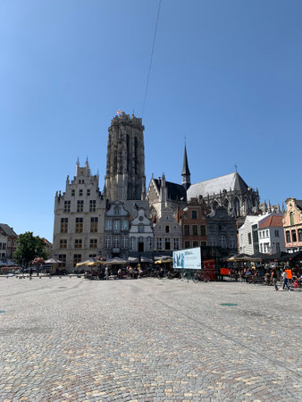 Mechelen city skyline with Brabantian Gothic style St. Rumbold's Cathedral, market square (grote markt) and old houses. Mechelen, Province of Antwerp, Belgiumのeditorial素材