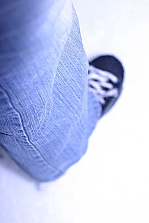 Jeans and shoe on white background