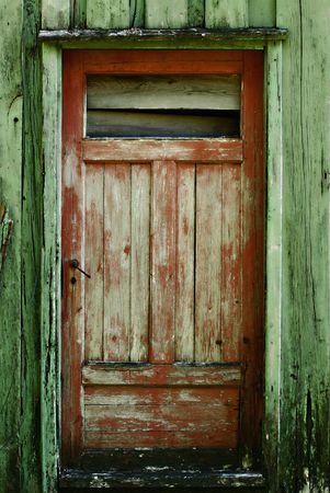 Wooden door on an old houseの写真素材