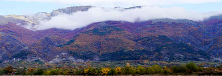 Panoramic view of the autumn forest in the mountains. Autumn landscape.の写真素材