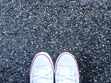 Part of shoes on cement, abstract backgroundの素材