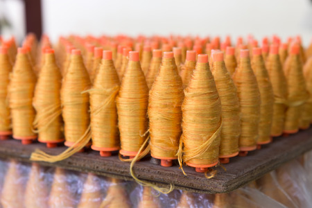 Raw silk yarn spools