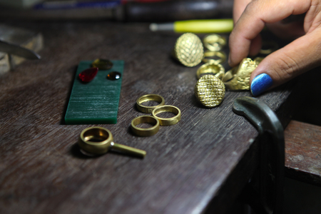 goldsmith checking ring after castingの写真素材