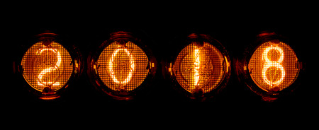 Nixie light bulbs, tubes with digits 2018. Vintage style Christmas photo on a dark background.の写真素材