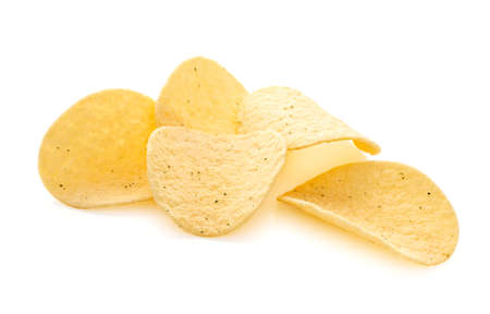Heap of potato chips, crisps isolated on white background.の写真素材