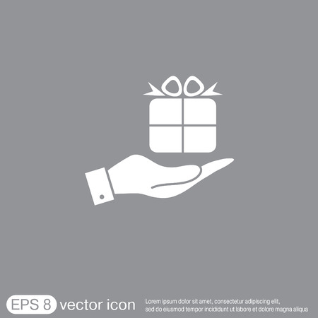 hand holding a Holiday Gift Box Icon. Vector illustrationのイラスト素材