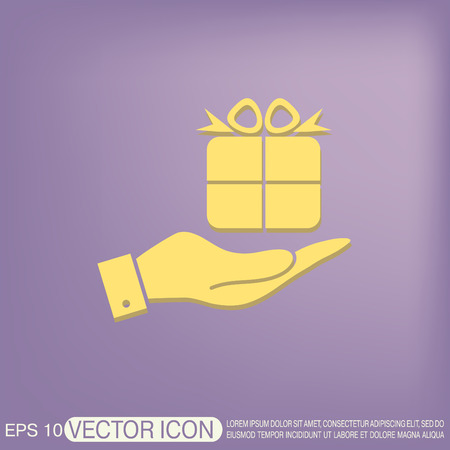 hand holding a Holiday Gift Box Icon. Vector illustrationのイラスト素材
