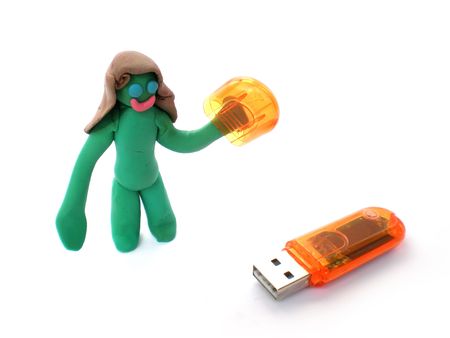 plasticine figure of a green woman carry a usb flash 