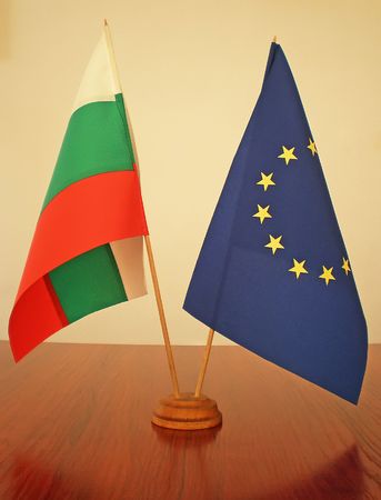 bulgarian and european flags on a wooden table     の写真素材