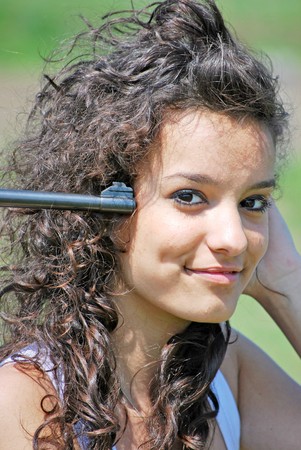 girl and gun portrait outdoors in farmの写真素材