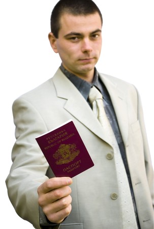 young business man holding his passport isolated on whiteの写真素材