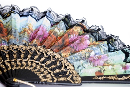 chinese traditional lace fan isolated on whiteの写真素材