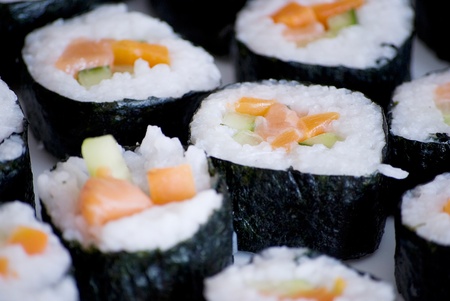 delicious homemade sushi in a white plateの写真素材