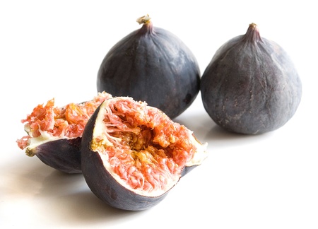 fresh organic figs over white background close upの写真素材
