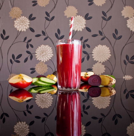 healthy juice made of variety fresh organic fruits and vegetablesの写真素材