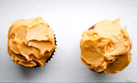 delicious homemade cupcakes with peanut butter icingの写真素材