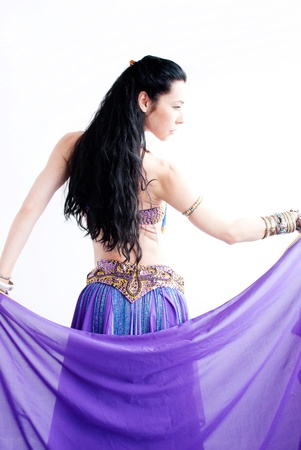 exotic young belly dancer, oriental dance isolated on white backgroundの写真素材