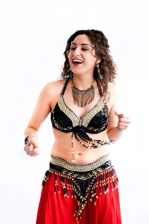 exotic young belly dancer, oriental dance isolated on white backgroundの写真素材