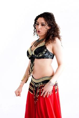 exotic young belly dancer, oriental dance isolated on white backgroundの写真素材