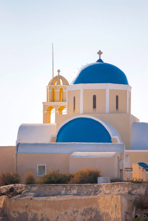 Oia Santorini Greece famous with romantic and beautiful sunsetsの写真素材