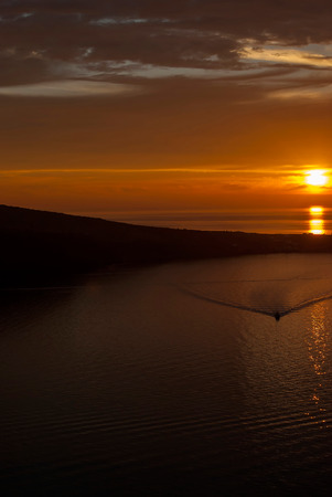 Oia Santorini Greece famous with beautiful romantic sunsetsの写真素材