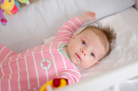 little cute baby girl playing in a cotの写真素材