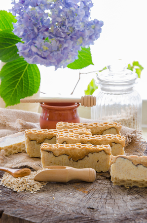 homemade oats honey and cinnamon soap using olive oil shea and cocoa butterの写真素材