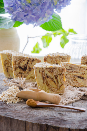 homemade oats and cinnamon soap using olive oil shea and cocoa butterの写真素材