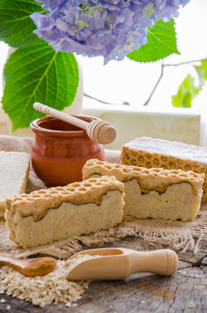 homemade oats honey and cinnamon soap using olive oil shea and cocoa butterの写真素材