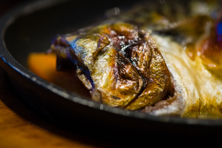 delicious japan food style menu.traditional japanese local food Saba grilled with teriyaki sauce on hot pan.japanese chef cooking at japanese restaurant and cafe.tasty japanese food on hot pan.の写真素材