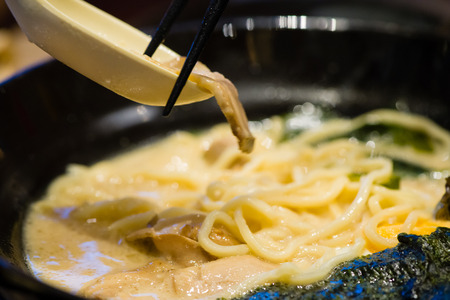 delicious japan food style menu.traditional japanese local Ramen noodle on black dish.japanese chef cooking Ramen noodles at japanese restaurant.tasty japanese food served on dish.の写真素材
