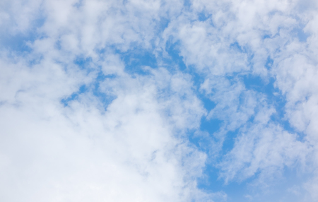 clear blue sky with white clouds on good weather.blue sky on sunlight background.skyscape.cloudscape.beautiful vast blue sky and fluffy clouds with some space.の写真素材