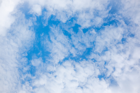clear blue sky with white clouds on good weather.blue sky on sunlight background.skyscape.cloudscape.beautiful vast blue sky and fluffy clouds with some space.の写真素材