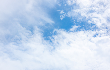 clear blue sky with white clouds on good weather.blue sky on sunlight background.skyscape.cloudscape.beautiful vast blue sky and fluffy clouds with some space.の写真素材