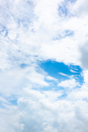 clear blue sky with white clouds on good weather.blue sky on sunlight background.skyscape.cloudscape.beautiful vast blue sky and fluffy clouds with some space.の写真素材