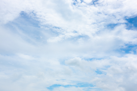 clear blue sky with white clouds on good weather.blue sky on sunlight background.skyscape.cloudscape.beautiful vast blue sky and fluffy clouds with some space.の写真素材