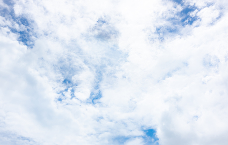 clear blue sky with white clouds on good weather.blue sky on sunlight background.skyscape.cloudscape.beautiful vast blue sky and fluffy clouds with some space.の写真素材