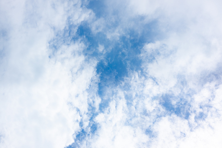 clear blue sky with white clouds on good weather.blue sky on sunlight background.skyscape.cloudscape.beautiful vast blue sky and fluffy clouds with some space.の写真素材
