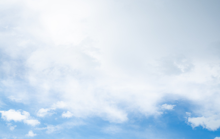 clear blue sky with white clouds on good weather.blue sky on sunlight background.skyscape.cloudscape.beautiful vast blue sky and fluffy clouds with some space.の写真素材