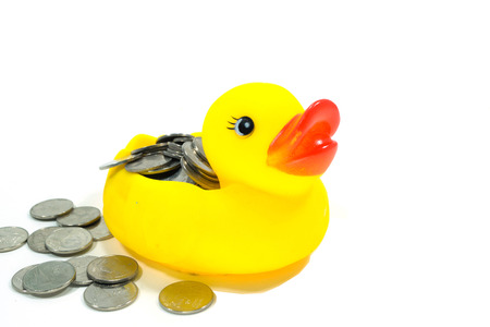 Rubber duck and coinの写真素材