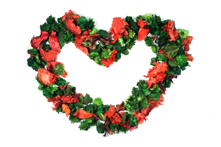 Potpourri as a heart on white backgroundの写真素材