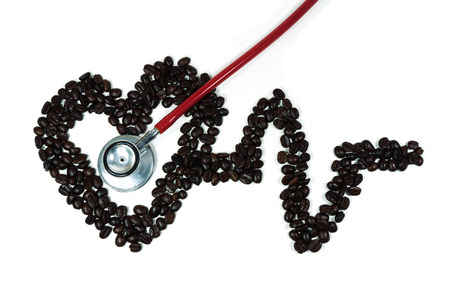 cardiogram line forming heart made from coffee bean の写真素材