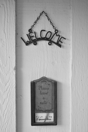 welcome sign with note pad and boxの写真素材