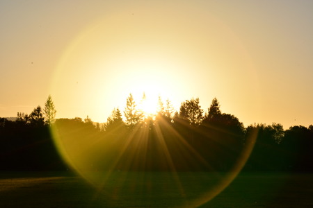 sunset over a fieldの写真素材