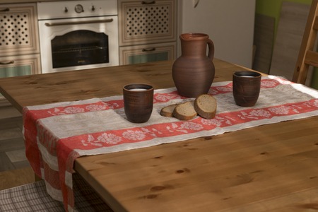 Still life with pottery, milk and bread in the kitchen in the countryside