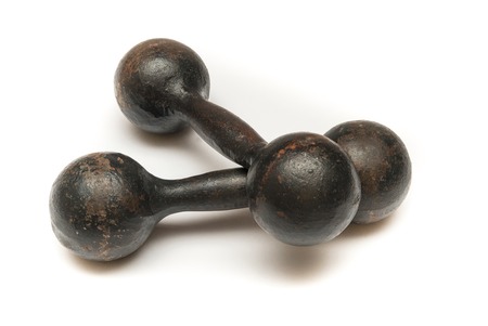 old rusty dumbbell on a white backgroundの写真素材