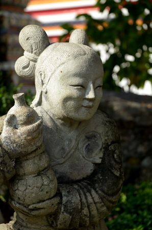 Little Chinese girl sculpture at Wat Pho, Bangkok, Thailandのeditorial素材