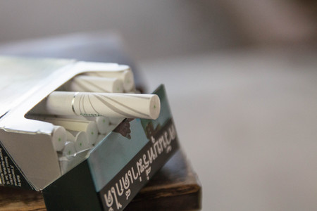 smoking a cigarette,  cigaretteの写真素材