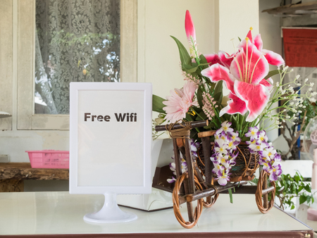 Free wifi sign and flowers with copy spaceの写真素材