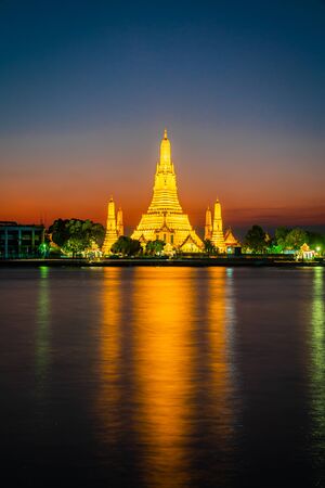 Wat Arun or Temple of Dawn at sunset. One of the most famous temple and tourists attraction in Bangkok, Thailandの写真素材